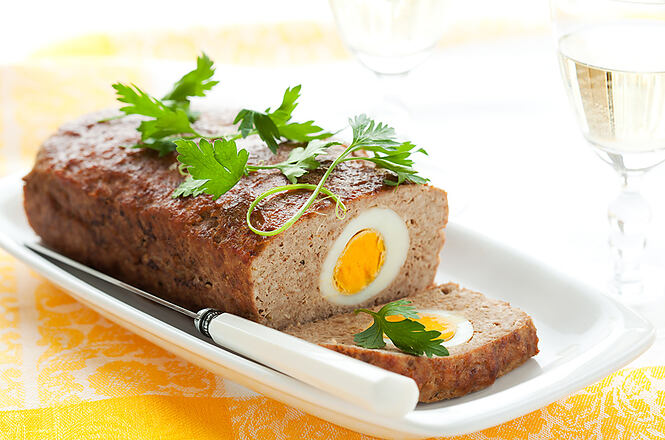 baked meatloaf with boiled eggs for Easter